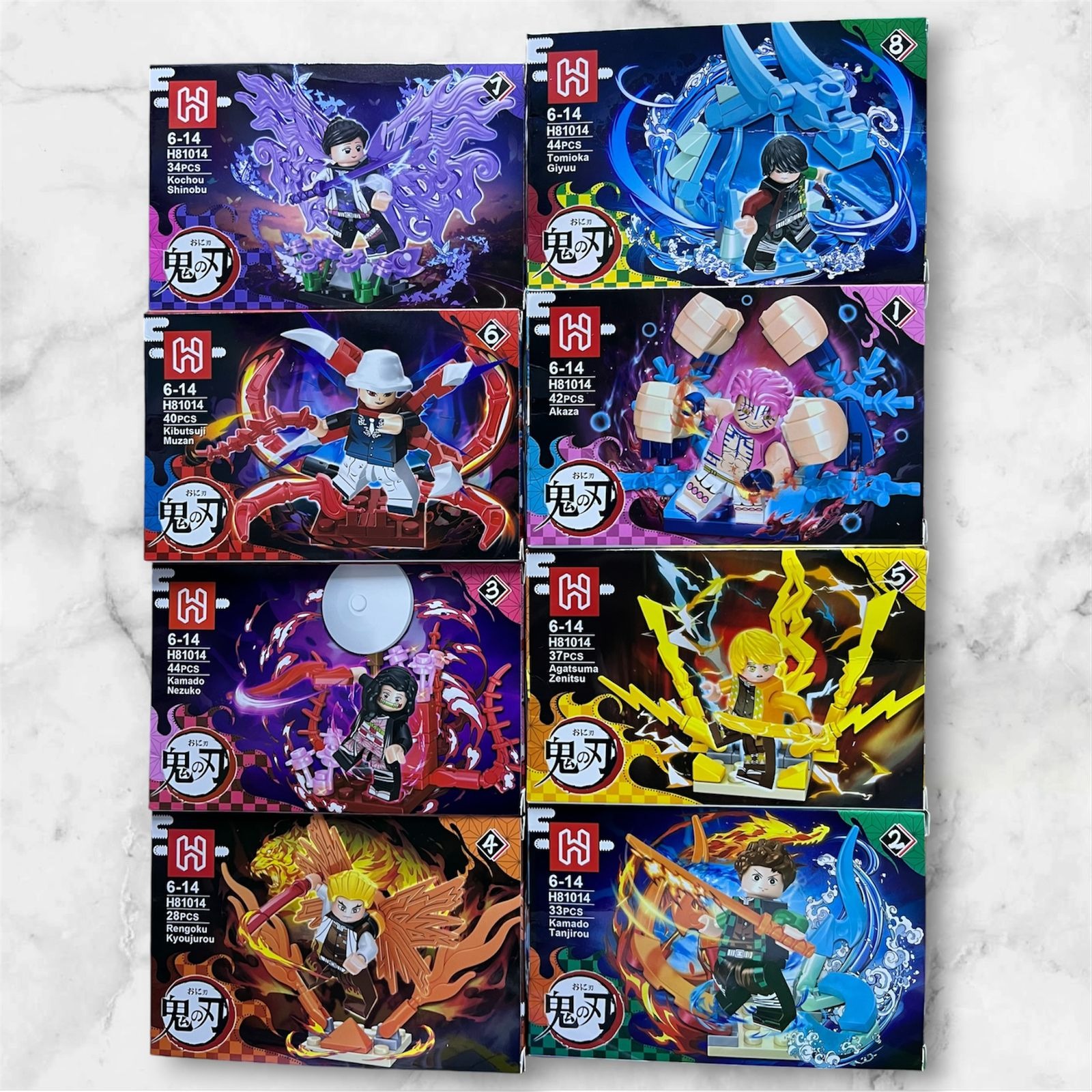 Set de 8 figuras Demon Slayer armables H81014 con Tanjiro, Nezuko, Zenitsu y más, compatible con LEGO