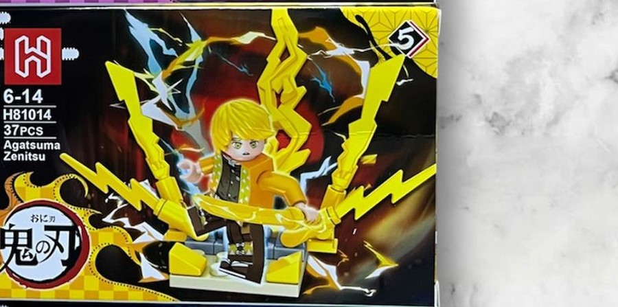 Figura armable de Zenitsu Agatsuma de Demon Slayer con respiración del trueno, set H81014, 37 piezas