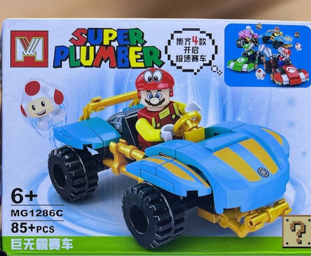 Auto de carrera azul armable estilo Mario Kart con figura de Toad, caja MG1286C del set Mario Bros Super Plumber compatible con LEGO