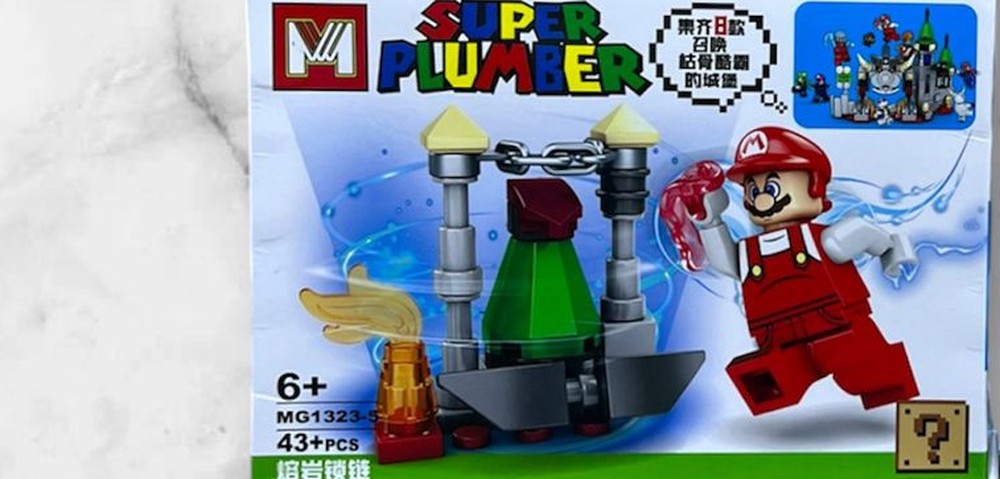 Figura armable de Mario de Fuego (Fire Mario) con torres y cadenas, caja MG1323-5 del set Mario Bros Super Plumber