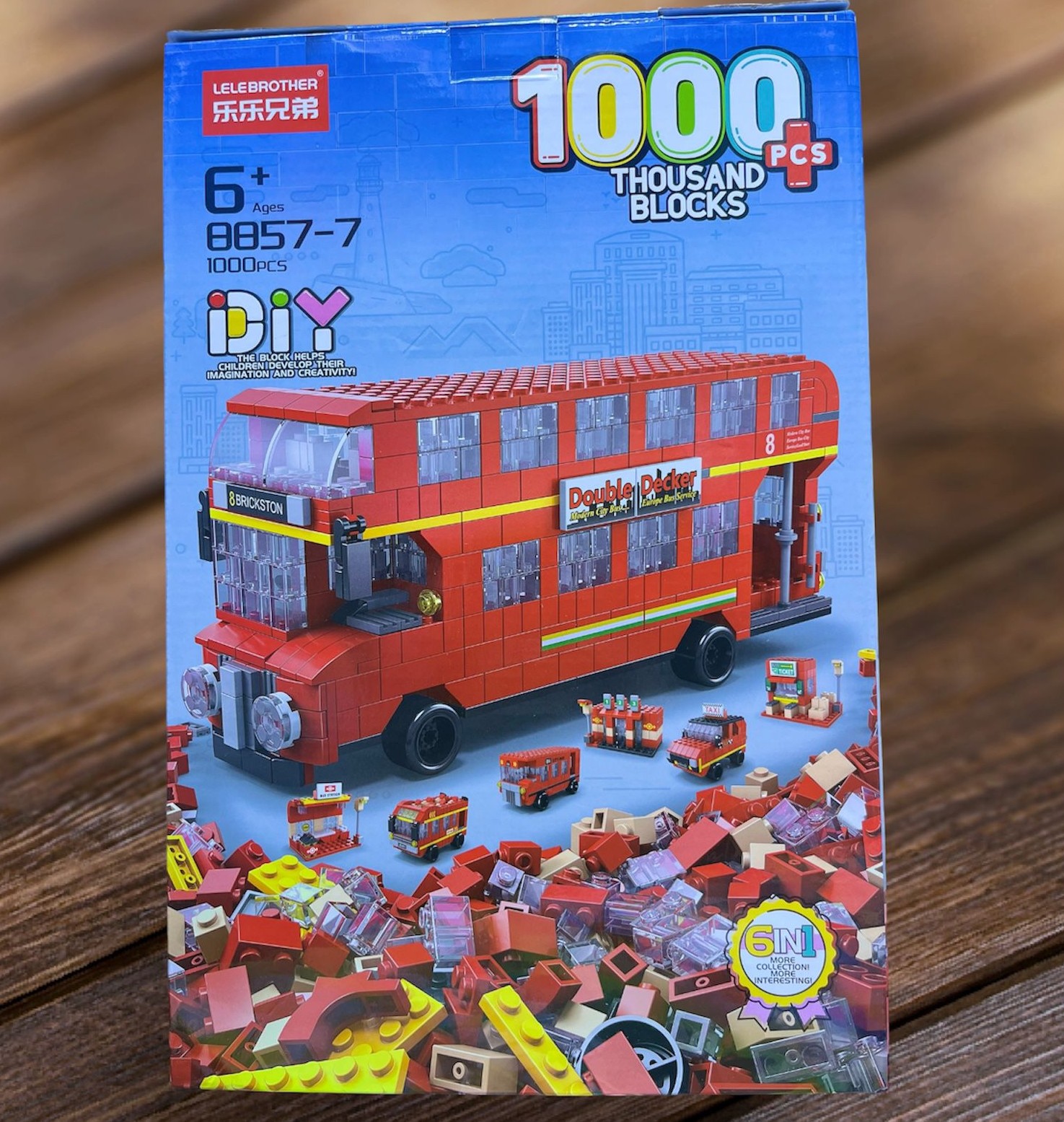 Caja del set Lele Brother Bus de Dos Pisos 8857-7 de 1000 piezas compatible con LEGO