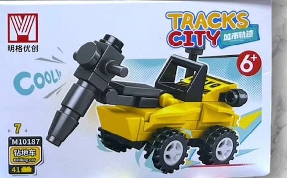 Caja individual Tracks City M10187-7 Drilling Car amarillo de 41 piezas, vehiculo perforador armable