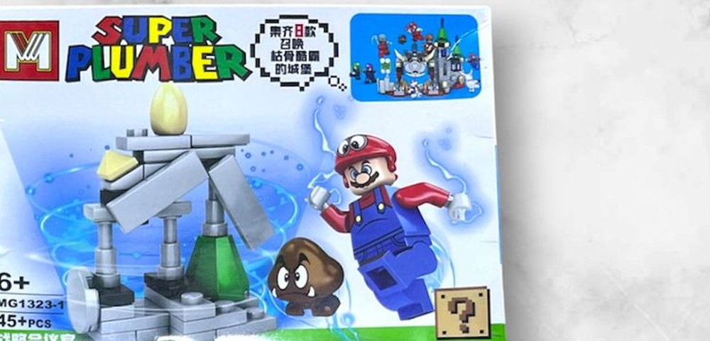 Figura armable de Mario con Goomba y bloque de construcción, caja MG1323-1 del set Mario Bros Super Plumber compatible con LEGO