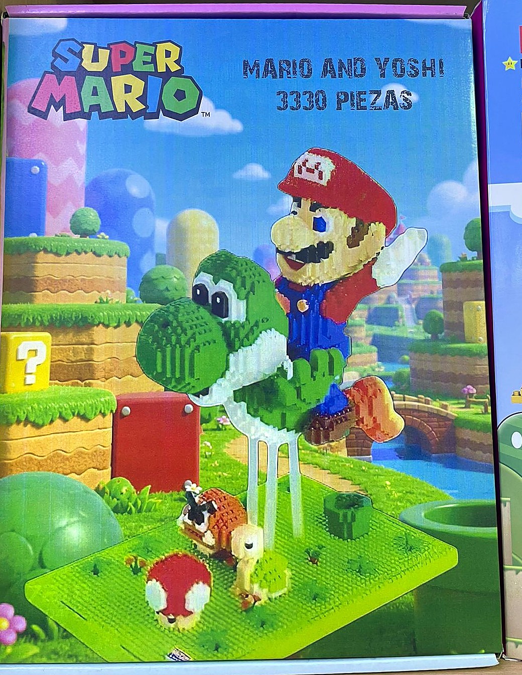 Caja del set Super Mario Mario and Yoshi de 3330 piezas con Mario montado sobre Yoshi