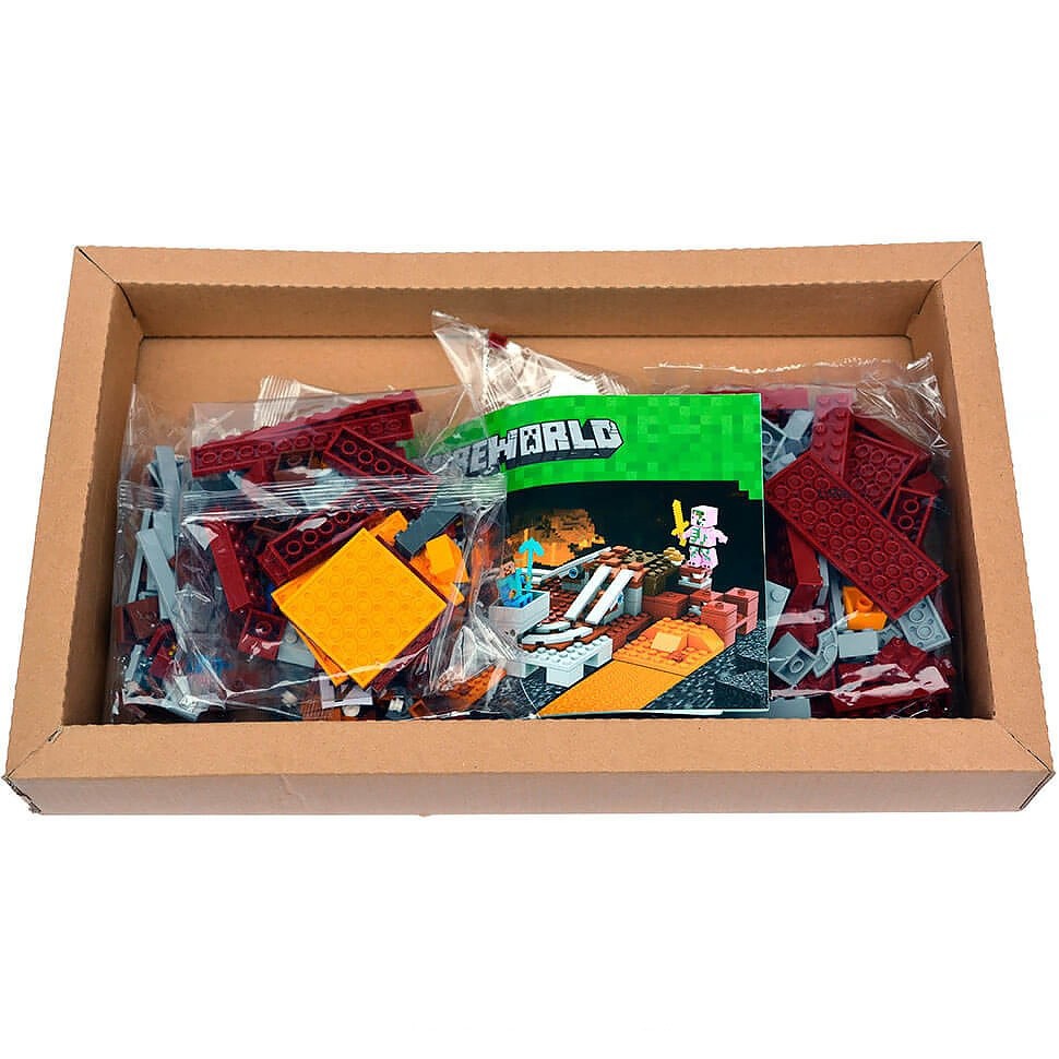 Contenido de la caja del set Minecraft 10620: bolsas de piezas y manual de instrucciones My World