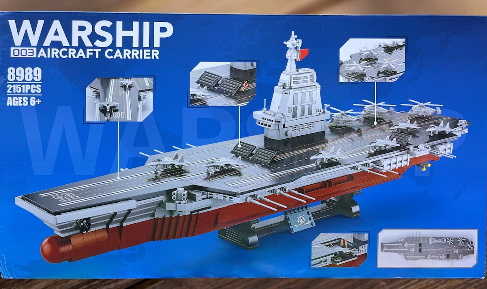 Frente de la caja del portaaviones armable Warship 003 modelo 8989 con 2,151 piezas para edades 6+