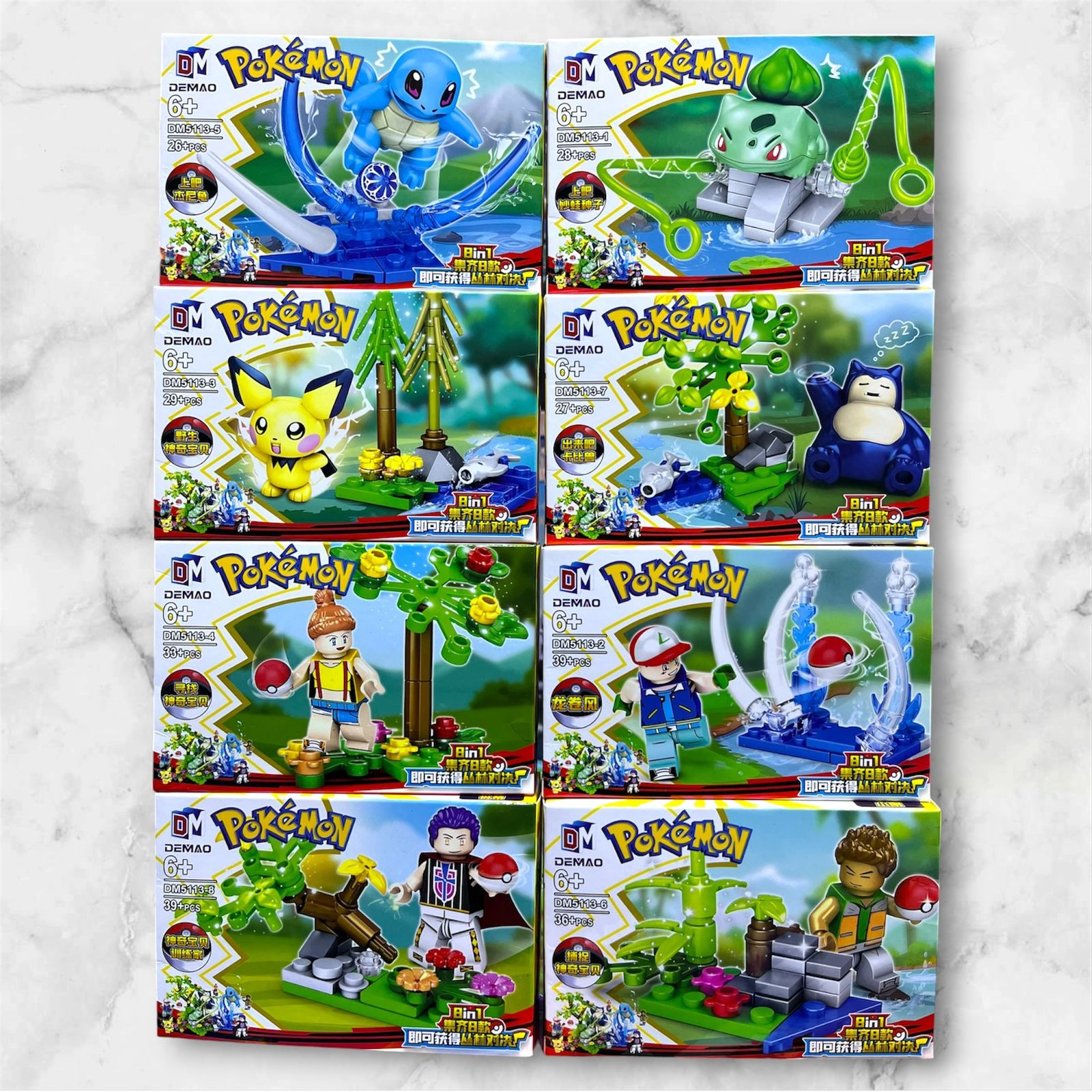 Set de 8 figuras Pokémon armables DEMAO DM5113 compatibles con LEGO: Squirtle, Bulbasaur, Pichu, Snorlax y 4 entrenadores Pokémon con pokebolas y escenas