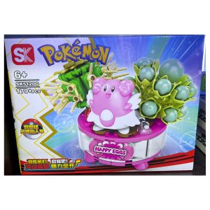 Caja del set SK Pokemon Happy Eggs Chansey SK5120G de 179 piezas con figura rosa y base de exhibicion