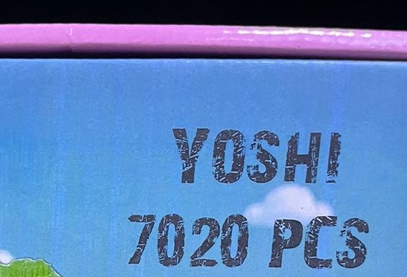 Logo Super Mario y 7020 piezas de la figura armable de Yoshi